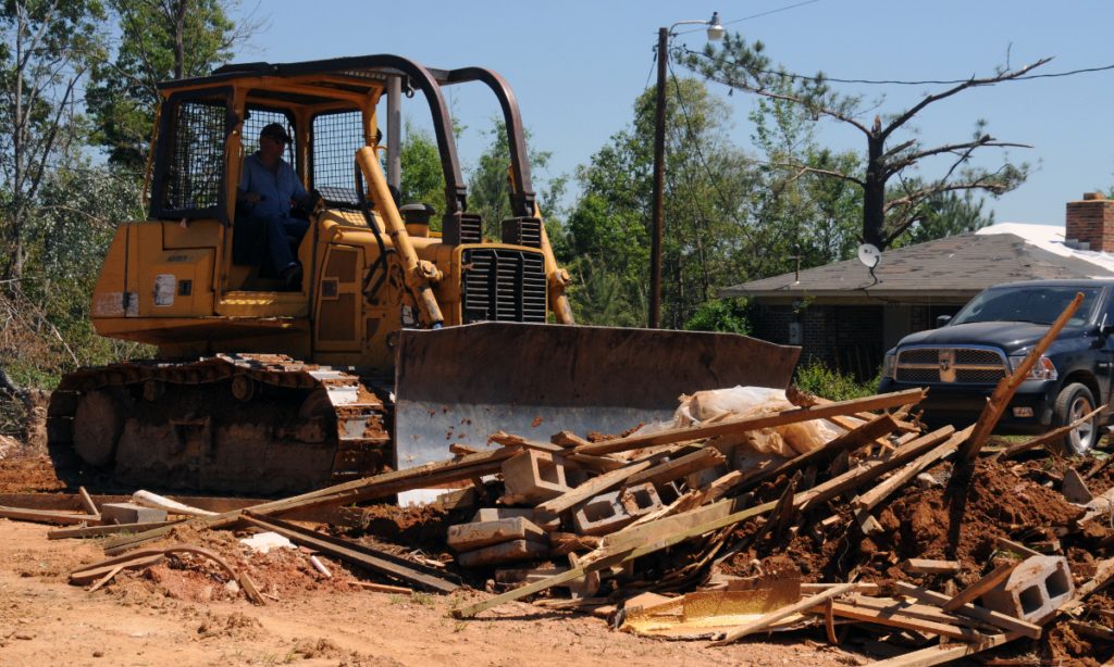 Weir, MS, May 5, 2010 -- This volunteer is moving storm debris to the street for removal. Volunteers provide important service as FEMA and the State respond to the tornado of April 24. George Armstrong/FEMA